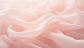 Soft blush pink organza fabric texture with delicate sheerness catching the light Royalty Free Stock Photo