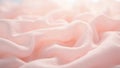 Soft blush pink organza fabric texture with delicate sheerness catching the light Royalty Free Stock Photo