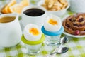 Soft boiled chicken egg, coffee, baking, muesli and orange juice Royalty Free Stock Photo