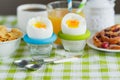 Soft boiled chicken egg, coffee, muesli and orange juice Royalty Free Stock Photo