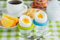 Soft boiled chicken egg, coffee, muesli and orange juice Royalty Free Stock Photo