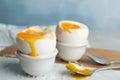 Soft boiled chicken eggs on white table Royalty Free Stock Photo
