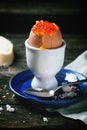 Soft-boiled egg with red caviar Royalty Free Stock Photo