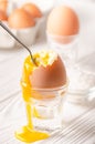 Soft-boiled egg on a stand on the table. A delicious, nutritious wholesome continental breakfast Royalty Free Stock Photo