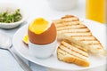 Soft boiled egg with toast for rich breakfast. Royalty Free Stock Photo