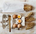 Soft boiled eggs and wholemeal bread. Royalty Free Stock Photo