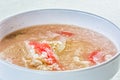 Soft-boiled rice with fish and imitation crabmeat