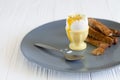 Soft boiled runny egg in an eggcup with toasted bread for breakfast Royalty Free Stock Photo