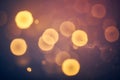 Soft bokeh lights creating warm glowing circular effects on blurred background Royalty Free Stock Photo