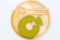 Soft butter cake on wooden plate, top viewSoft layers green tea cake on wooden plate, top view Royalty Free Stock Photo