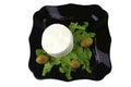 Soft cheese on black dish Royalty Free Stock Photo