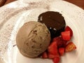 Soft chewy chocolate lava and Ovaltine ice-cream serving with fresh strawberry