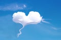 Soft clouds heart shape design close up on vast bright blue sky summer background