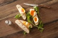 Soft cooked eggs sliced and served on bread Royalty Free Stock Photo