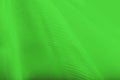 Soft corrugated green silk, vivid green background