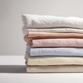 Soft Cotton Bed Sheets Folded Stack Light Pastel Tones White Background Top Down Studio Lighting Royalty Free Stock Photo