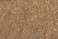 Soft covering of a walking trail gravel crushed stone crumb texture