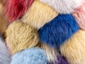 Soft cute colorful fluffy furry fuzzy decorative fur balls simple background texture, backdrop, multi colored group of objects up