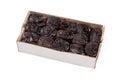 Soft date fruits in cardboard box on a white background Royalty Free Stock Photo