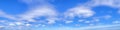 Soft dreamy blue sky with clouds panorama