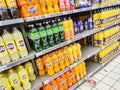 Soft drink bottle`s display for sell in french supermarket with selective focus Royalty Free Stock Photo