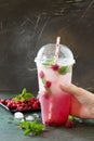 SOFT DRINKS. Refreshing summer drink raspberry with basil, ice. Royalty Free Stock Photo