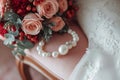 Soft elegance brides accessories on a pink chair, close up details Royalty Free Stock Photo