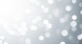 Soft White Bokeh Lights and Tiny Glittering Particles on a Light Grey Background circles Royalty Free Stock Photo