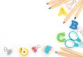 Soft English letters with school and office supplies on white background. Back to school, stationary concept. Kid`s set for