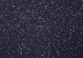 Soft falling white particles creating minimal abstract snowfall background Royalty Free Stock Photo