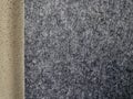 soft felt lining the wall of a room or office will make a more acoustically