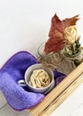 A soft fiber cloth for cleaning the house. Kitchen accessories on a white table.