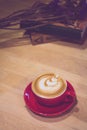 Soft filter image a cup of coffee on wood table with vintage ton Royalty Free Stock Photo