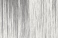 Soft, flowing lines of varying shades of grey and white create a visually striking abstract texture, emphasizing depth
