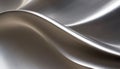 Soft flowing metallic waves with bright white and warm golden light reflections creating a smooth abstract background Royalty Free Stock Photo