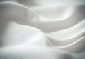 Soft, flowing white fabric creating elegant waves and textures