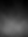 A soft focus abstract background of diffused grey and black tones with subtle lighter areas creating a moody and atmospheric Royalty Free Stock Photo