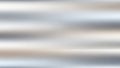 Soft focus horizontal blurred lines of light gray white and beige creating a smooth abstract background texture Royalty Free Stock Photo