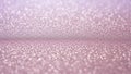 Soft focus background of shimmering pink and purple glitter with bokeh effect Royalty Free Stock Photo