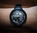 black smart modern digital sports watch with various functions, with connection to a mobile phone, health lifestyle Royalty Free Stock Photo