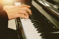Soft focus, blurr Playing piano with light sunset background.and instagram style filter photo vintage Royalty Free Stock Photo