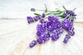 Soft focus Bunch of Lavender flowers on a white wooden table background, top view . Royalty Free Stock Photo