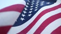 Soft focus close up of American Old Glory flag waving on wind. Stars and Stripes democracy, patriotism, freedom and Independence