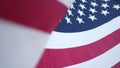 Soft focus close up of American Old Glory flag waving on wind. Stars and Stripes democracy, patriotism, freedom and Independence