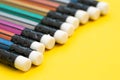 Soft focus on colorful pencil with eraser on solid yellow background with copy space using as writing, mistake and correction or Royalty Free Stock Photo