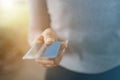 Soft focus of female hand holding a credit card, hand of woman passing a payment credit card Royalty Free Stock Photo