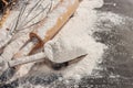 Soft focus: flour, ears of wheat barley cooking bread, and cookies arranged on a wooden tabletop in a rustic kitchen, top view Royalty Free Stock Photo