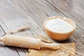 Soft focus, flour in a wooden bowl, ears of wheat, barley, cooking, bread, and cookies arranged on a wooden tabletop in a rustic Royalty Free Stock Photo