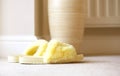 Soft focus of fluffy slipper on the carpet with blurry background of wooden jar and radiator, Warm and soft in pastel tone, Pair