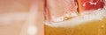 Soft focus of a glass of a foamy craft beer with blurry background